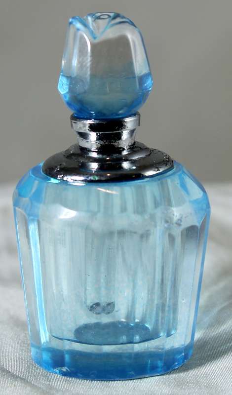 Miniature blue glass perfume bottle