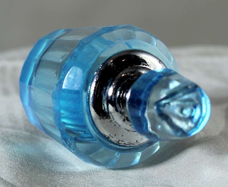 Miniature blue glass perfume bottle