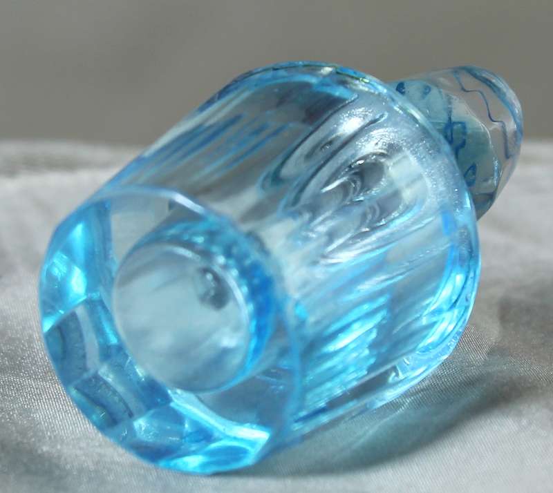 Miniature blue glass perfume bottle