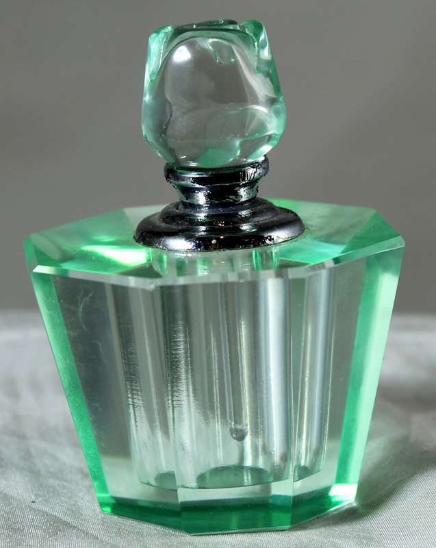 Mini green glass perfume bottle
