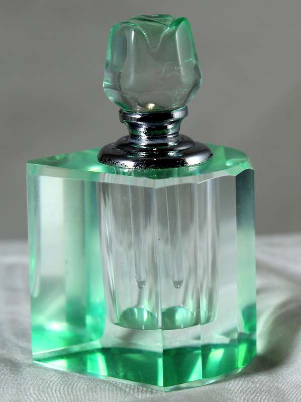 Mini green glass perfume bottle