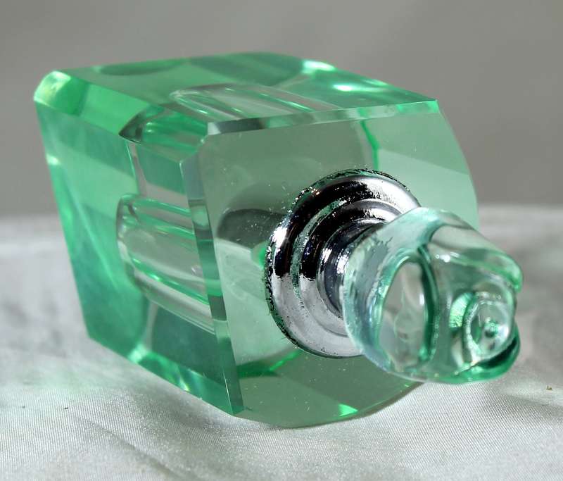 Mini green glass perfume bottle
