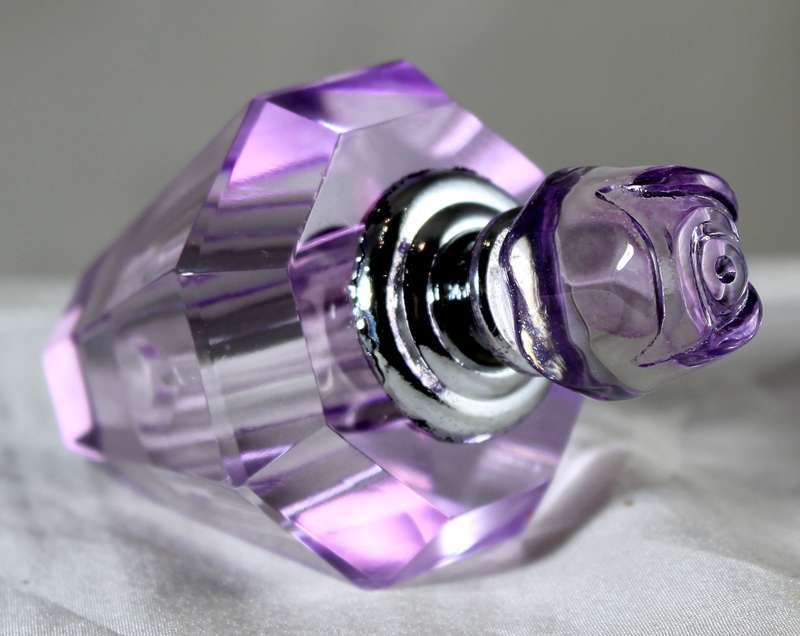 Mini purple glass perfume bottle