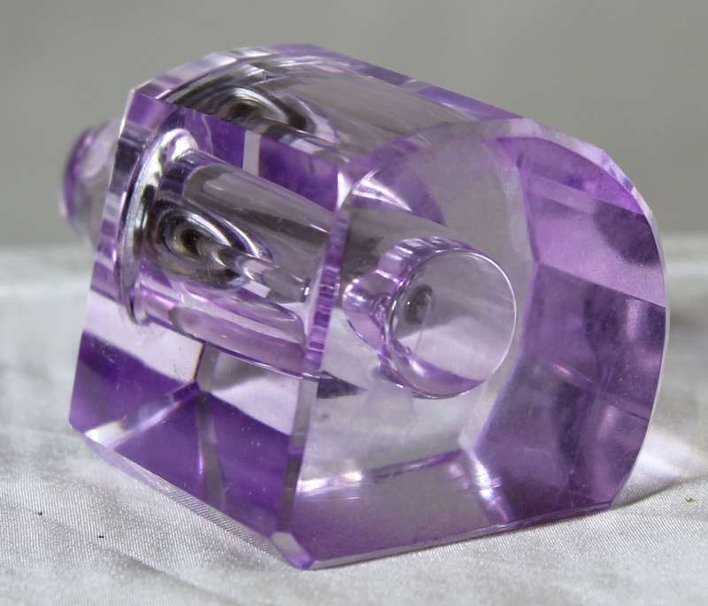 Mini purple glass perfume bottle