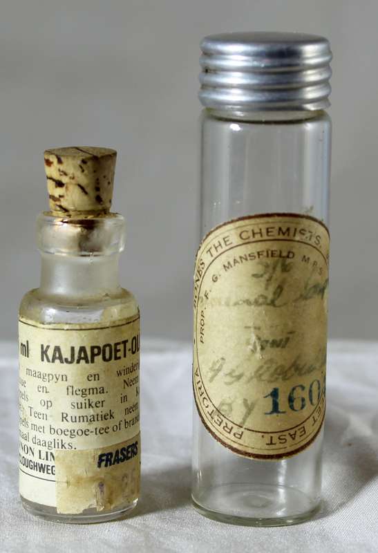 Pair of vintage miniature medicine bottles