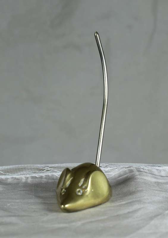 Miniature brass mouse with a tall brass tail