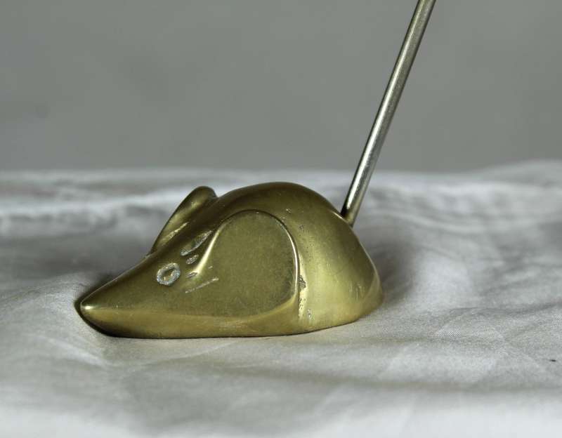 Miniature brass mouse with a tall brass tail