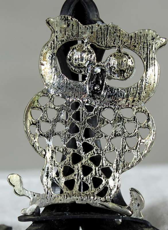 Miniature metal owl