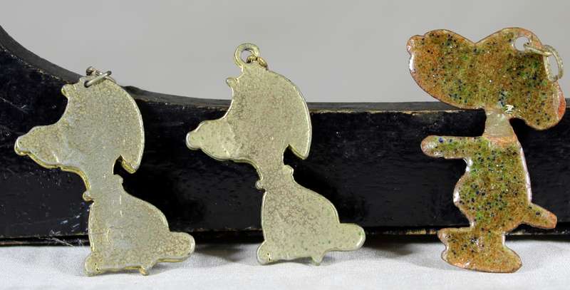 Three smiling puppies pendants