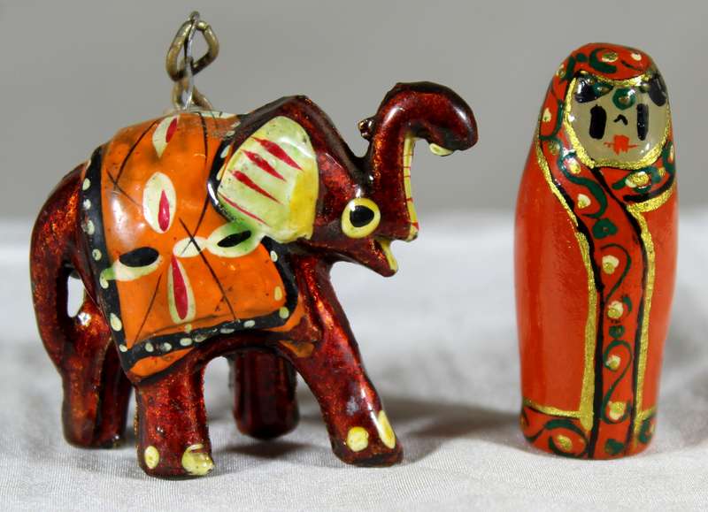 Elephant pendant plus a Russion doll