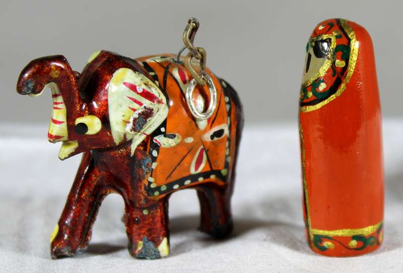 Elephant pendant plus a Russion doll