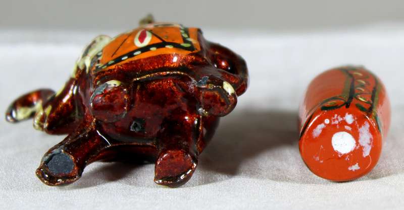 Elephant pendant plus a Russion doll
