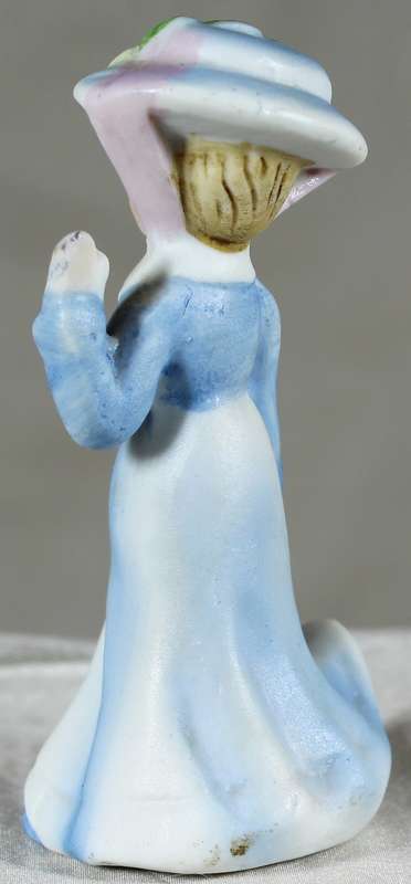Lady in fancy dress with hat