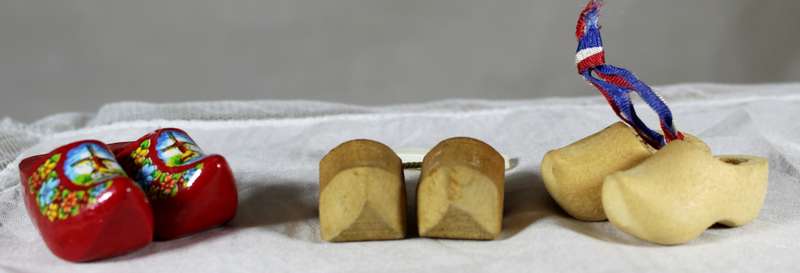 Three pairs of miniature Dutch wooden shoes