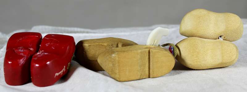 Three pairs of miniature Dutch wooden shoes