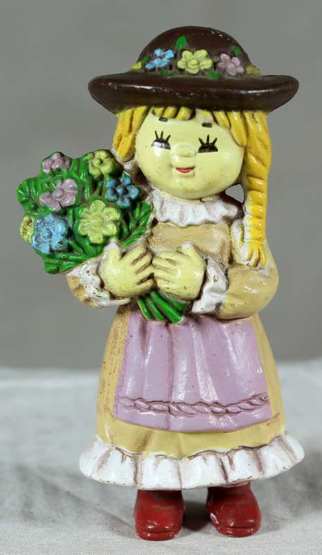 Pigtail girl holding flowers