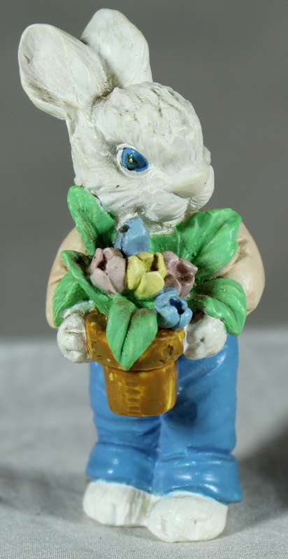 Rabbit carrying a flower pot