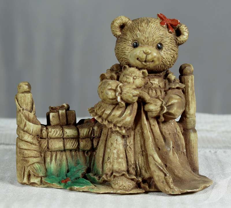 Molded baby bear with bear toy