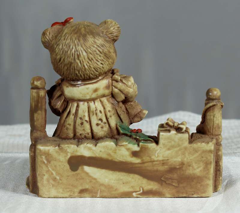 Molded baby bear with bear toy