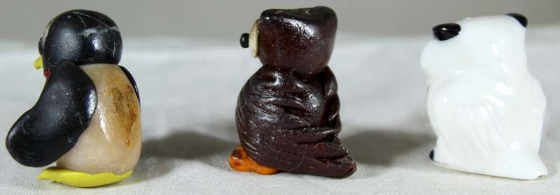 Set of two miniatures owls & a penguin
