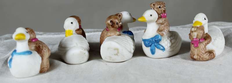 Set of five miniature ducks with bears