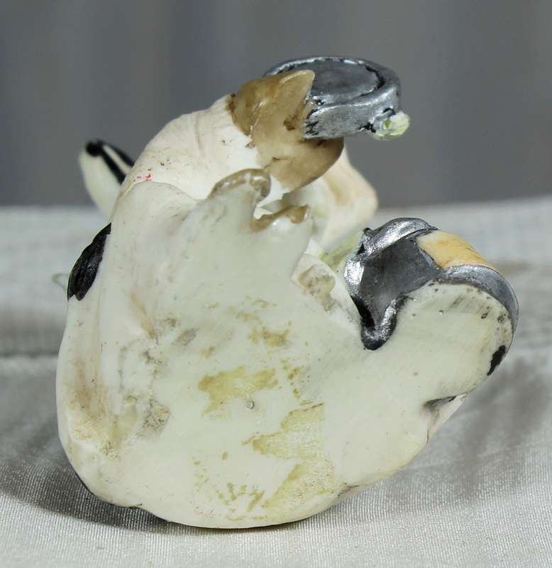 Molded small cow with milk can