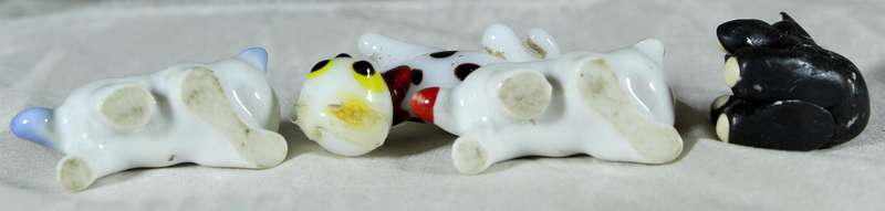 Set of four miniature cats