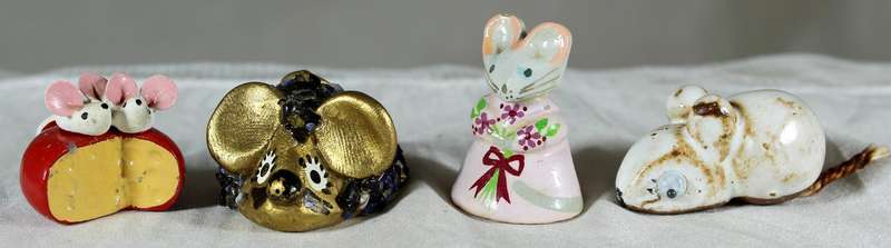 Set of four miniature mice