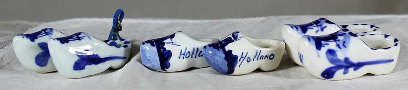 Small blue and white set of three Dutch porcelain shoes