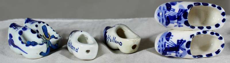 Small blue and white set of three Dutch porcelain shoes
