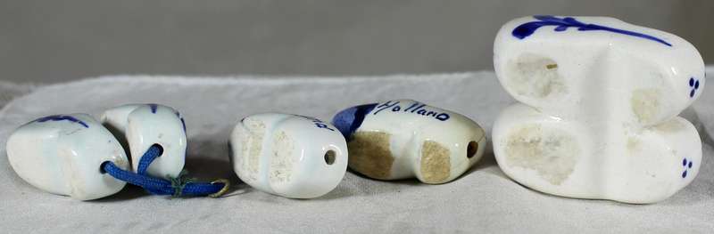 Small blue and white set of three Dutch porcelain shoes