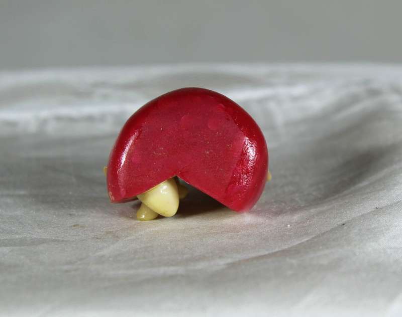 Mini miniature trio of mice in a roll of cheese