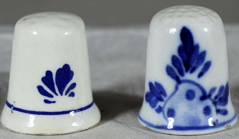Pair of Dutch themed thimbles