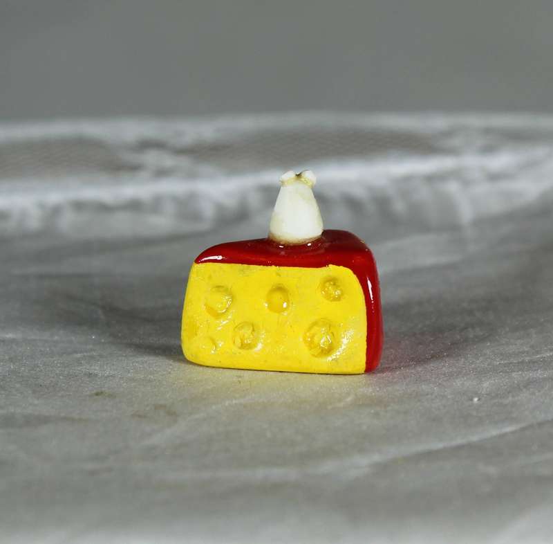 Mini miniature mice in a slice of cheese, by Fay