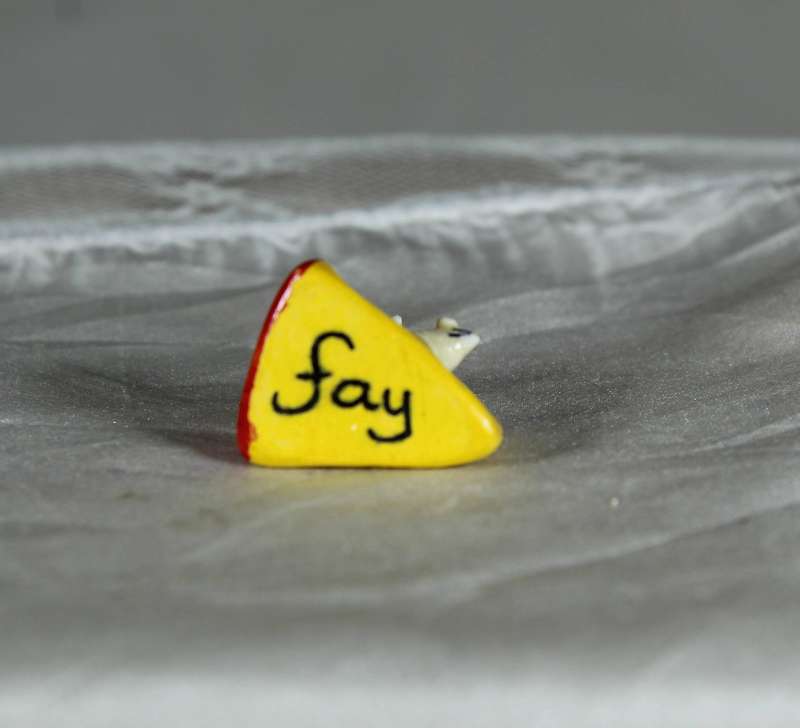 Mini miniature mice in a slice of cheese, by Fay