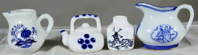 Set of four blue & white miniatures