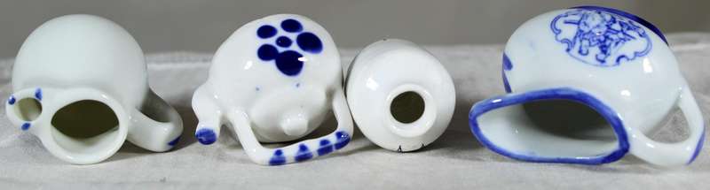 Set of four blue & white miniatures