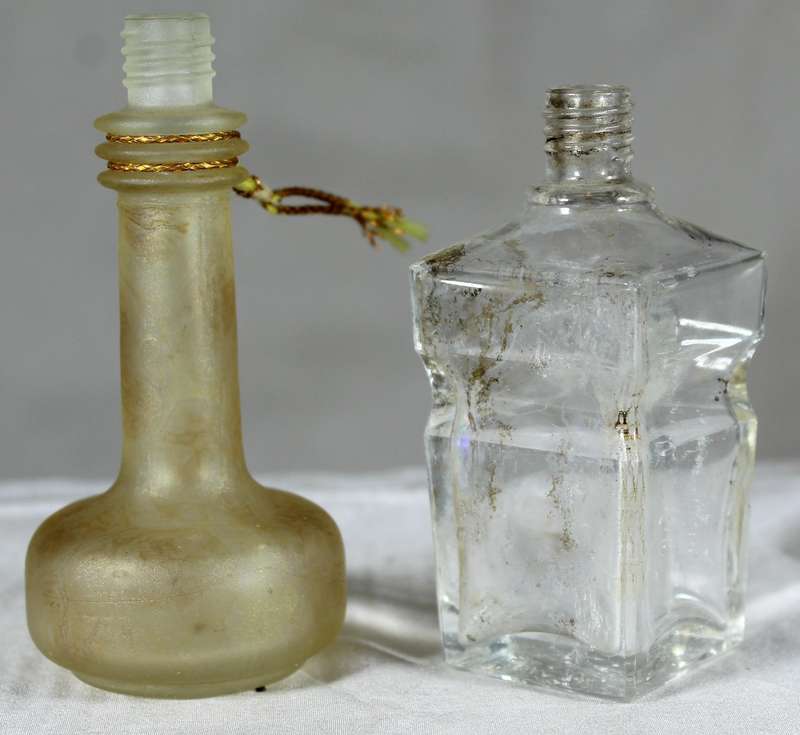 Pair of small vintage glass bottles