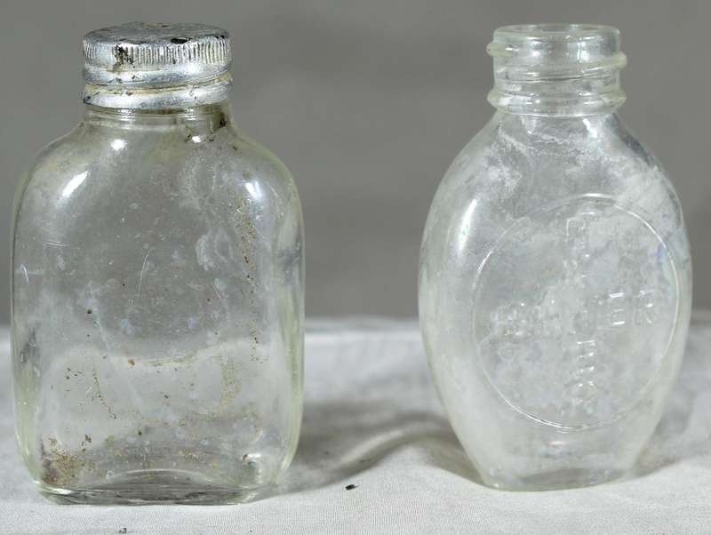 Pair of small vintage glass bottles