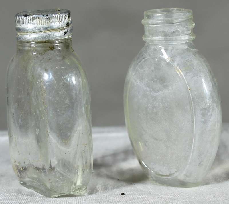 Pair of small vintage glass bottles
