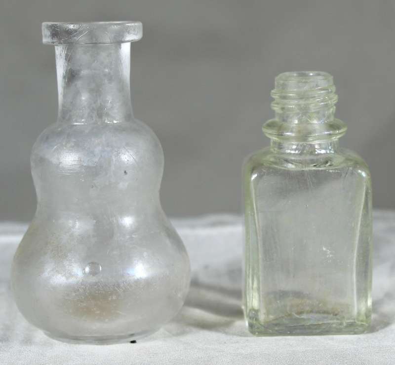 Pair of small vintage glass bottles