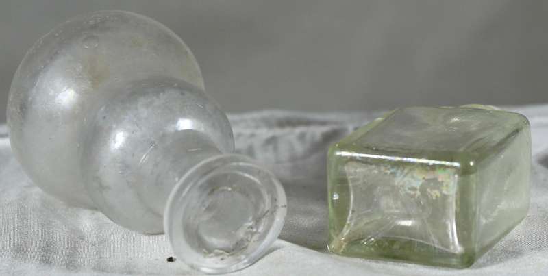 Pair of small vintage glass bottles