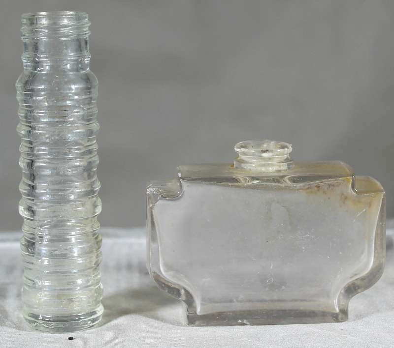 Pair of small vintage glass bottles