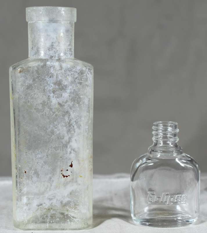 Pair of small vintage glass bottles