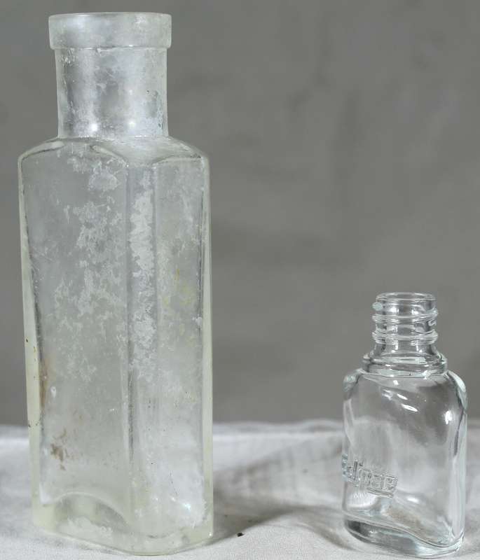 Pair of small vintage glass bottles