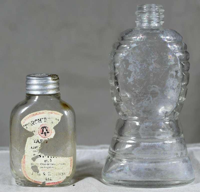 Pair of small vintage glass bottles
