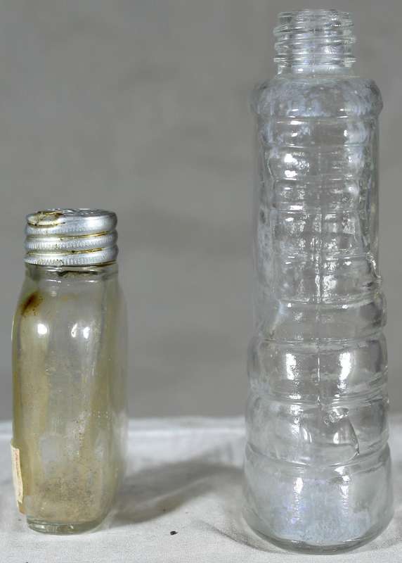 Pair of small vintage glass bottles