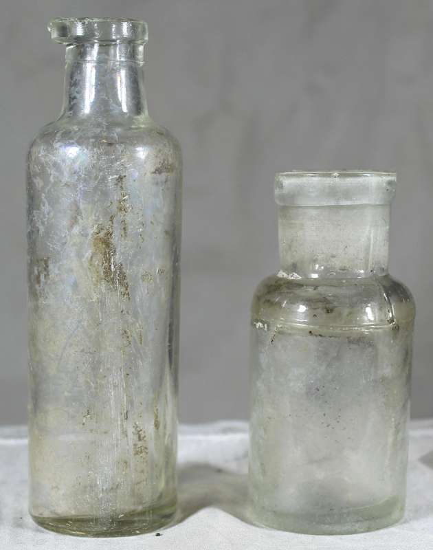 Pair of glass vintage bottles