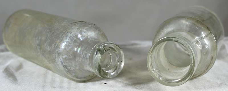 Pair of glass vintage bottles