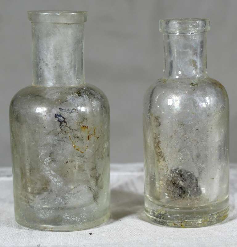 Pair of glass vintage bottles